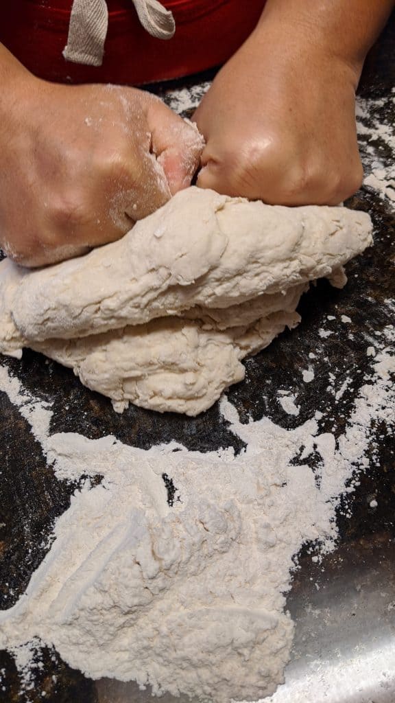 sourdough tortilla rolling and kneading