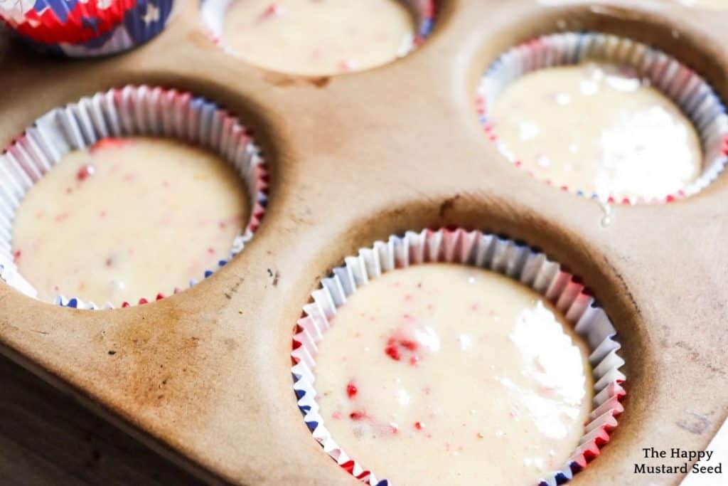 cupcake tin with cupcake batter