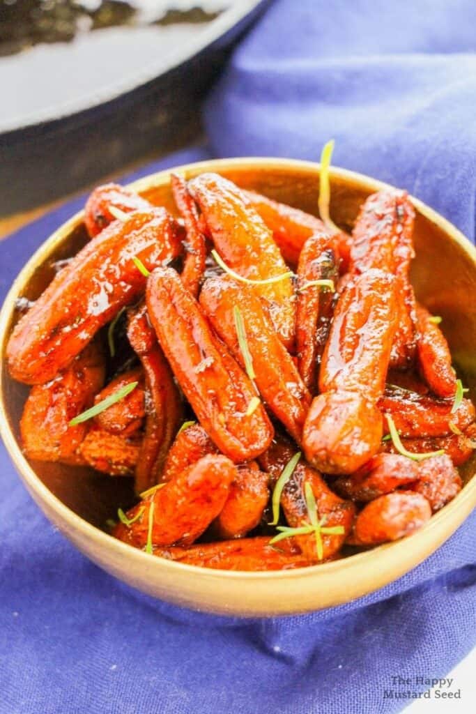 Old fashioned candied carrots in bowl
