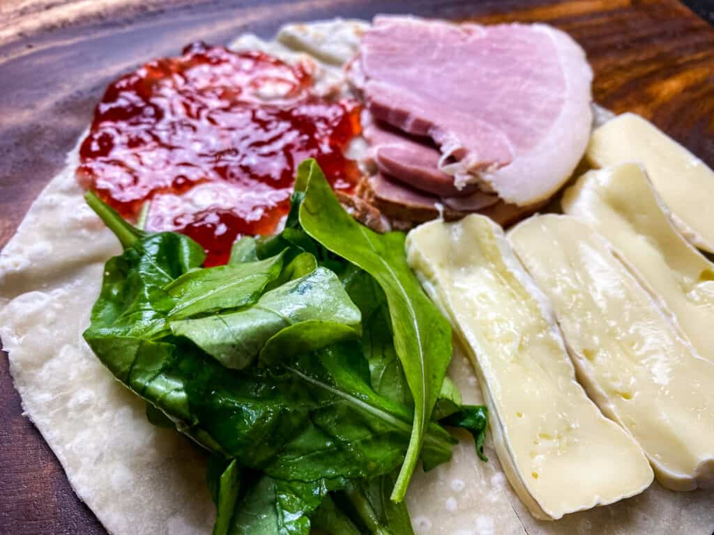 arugula-strawberry-raspberry-jam-ham-brie-on-sourdough-tortilla