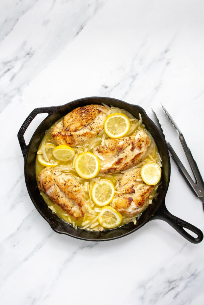 20 clove garlic chicken in a pan after cooking