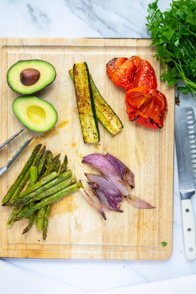 grilled veggies on a cutting board