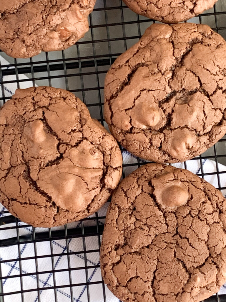 Double chocolate sourdough cookies recipe on wire rack