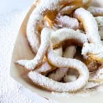 top view of funnel cake fries with powdered sugar