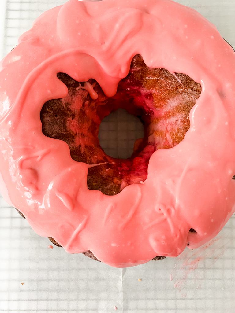 top view of pink glaze on strawberry pound cake
