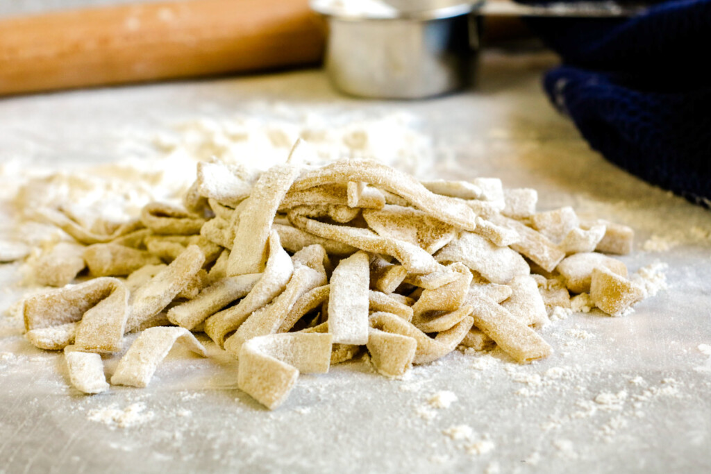 homemade pasta on floured surface made without a machine