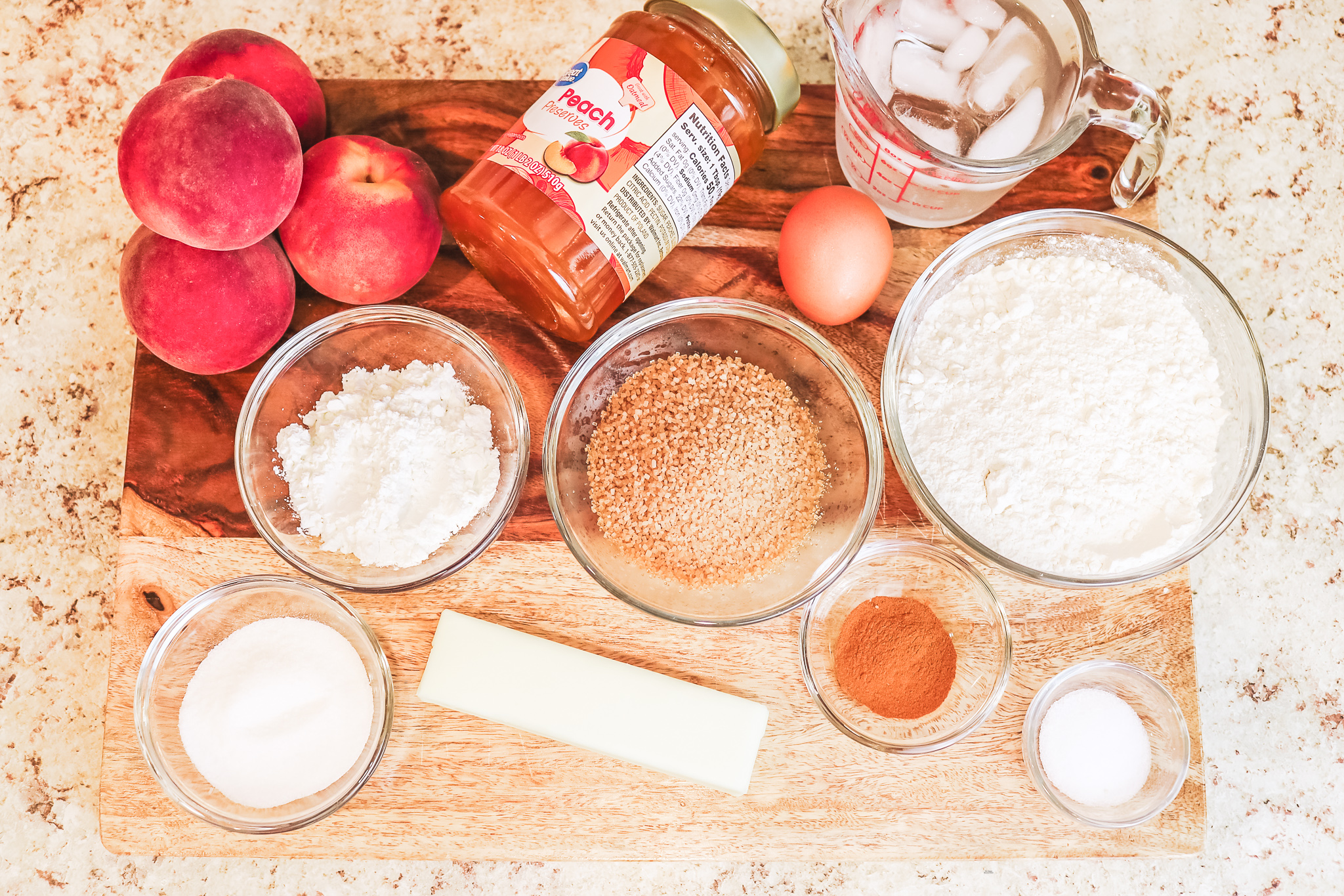 ingredients for galette such as sugar, floru, sourdough, apples, butter, egg