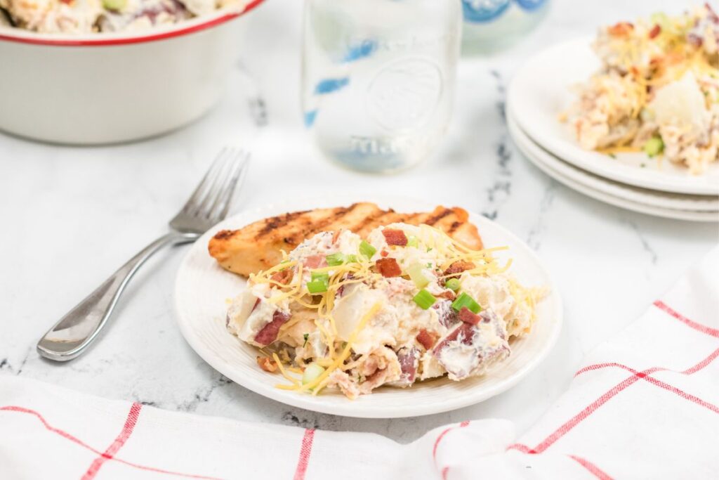 loaded steakhouse potato salad on plate ready to serve